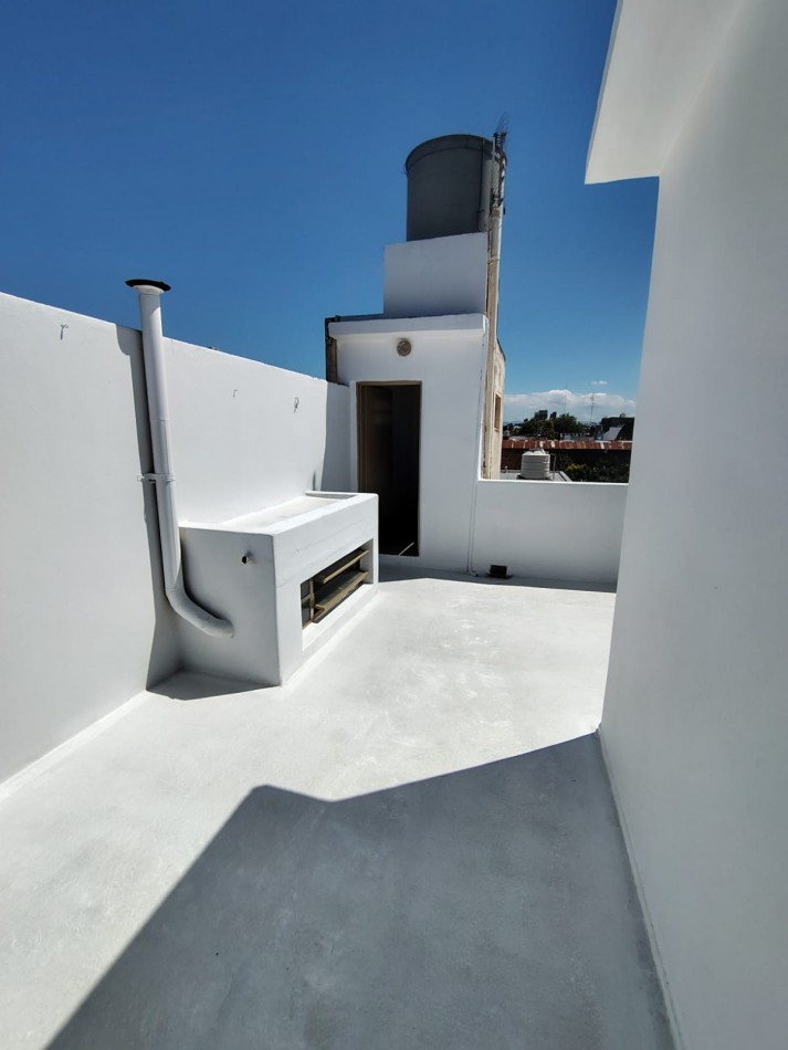 Departamento con terraza y asador